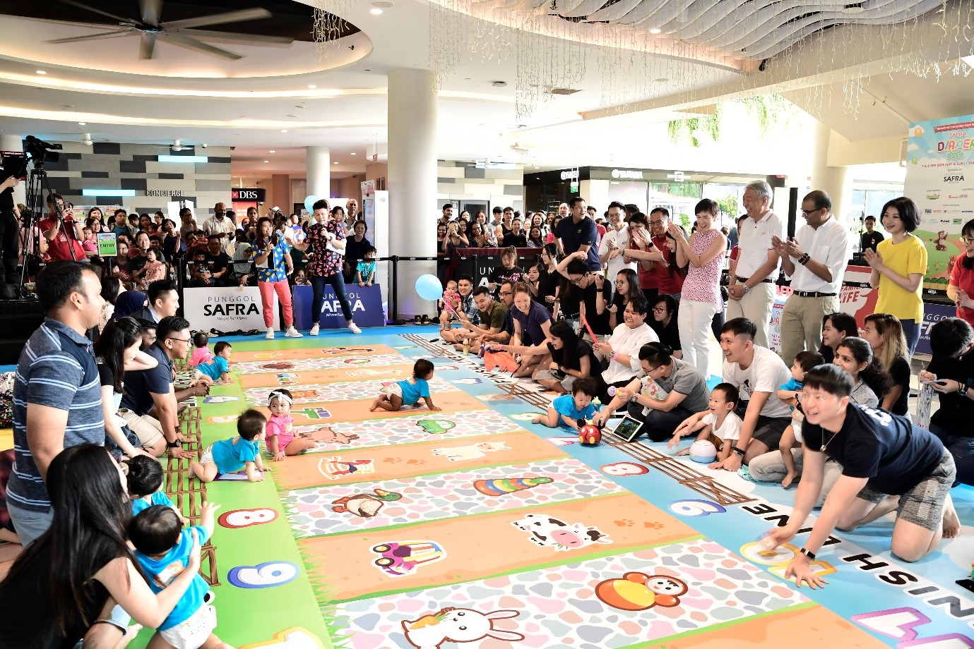 Babies in action during the SAFRA Diaper Dash.