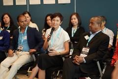 Minister Josephine Teo sharing her views with the Panel members during the conversation circle